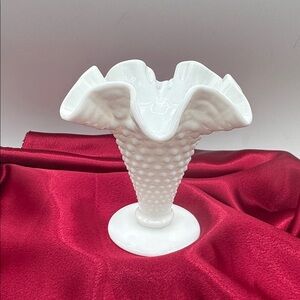 The Fenton Hobnail milk glass vase, approximately 4-inches tall.